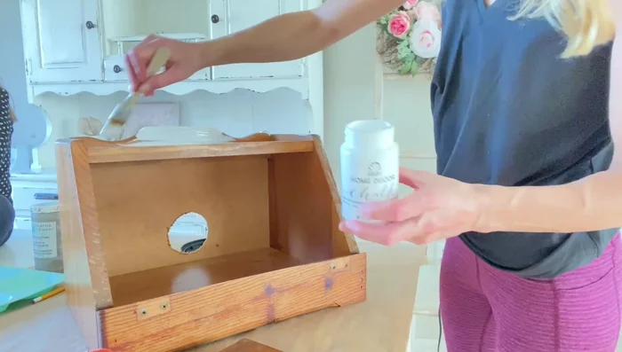 If paint cracks, embrace it! Use additional paint colors to create a faux wood finish.