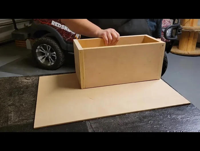 Cut and attach the bottom piece of plywood.