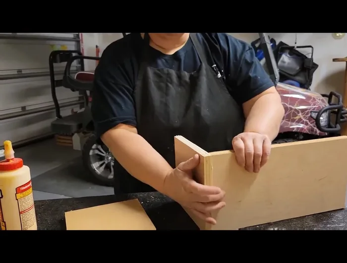 Cut and attach the bottom piece of plywood.