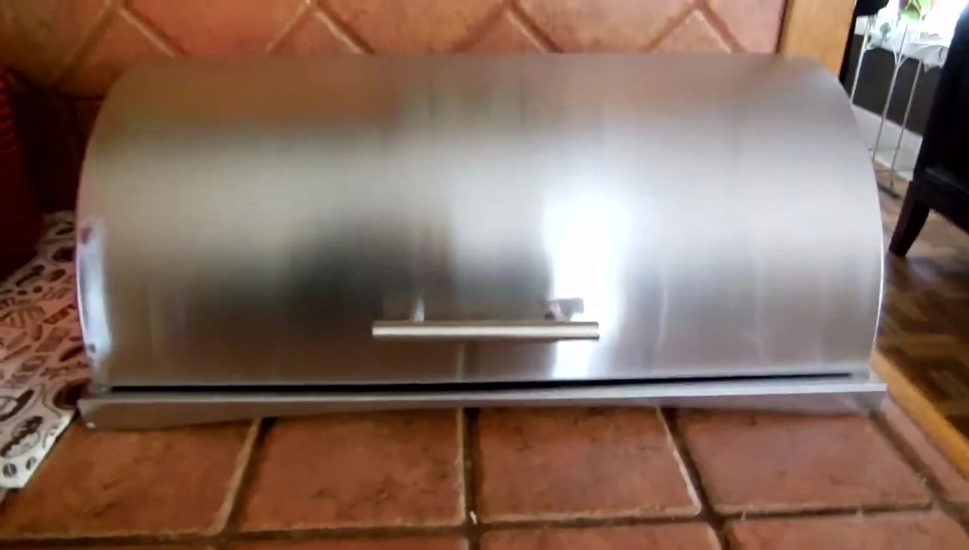 Close-up of the stainless steel breadbox.