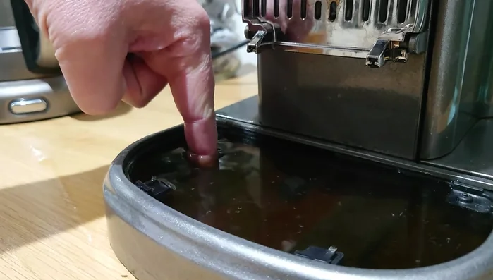 Identify the leak. This fix is specifically for leaks from behind the coffee pod release chamber when a pod is inside.