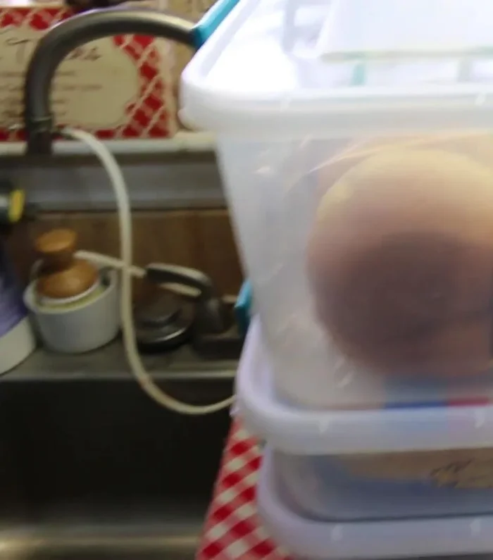 Measure the space under your kitchen cabinets to determine the size of bins needed.