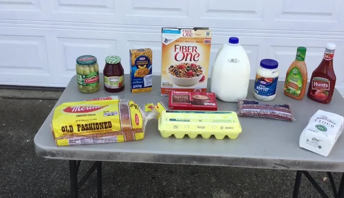 Repackage items from cardboard boxes into waterproof containers to prevent them from falling apart when damp.