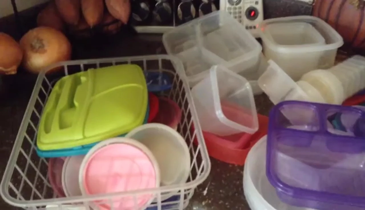 Image of old containers laid out for decluttering.