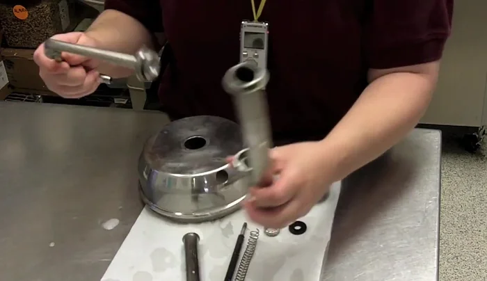 Align the flat edges of the next part, push in firmly, and twist to lock.