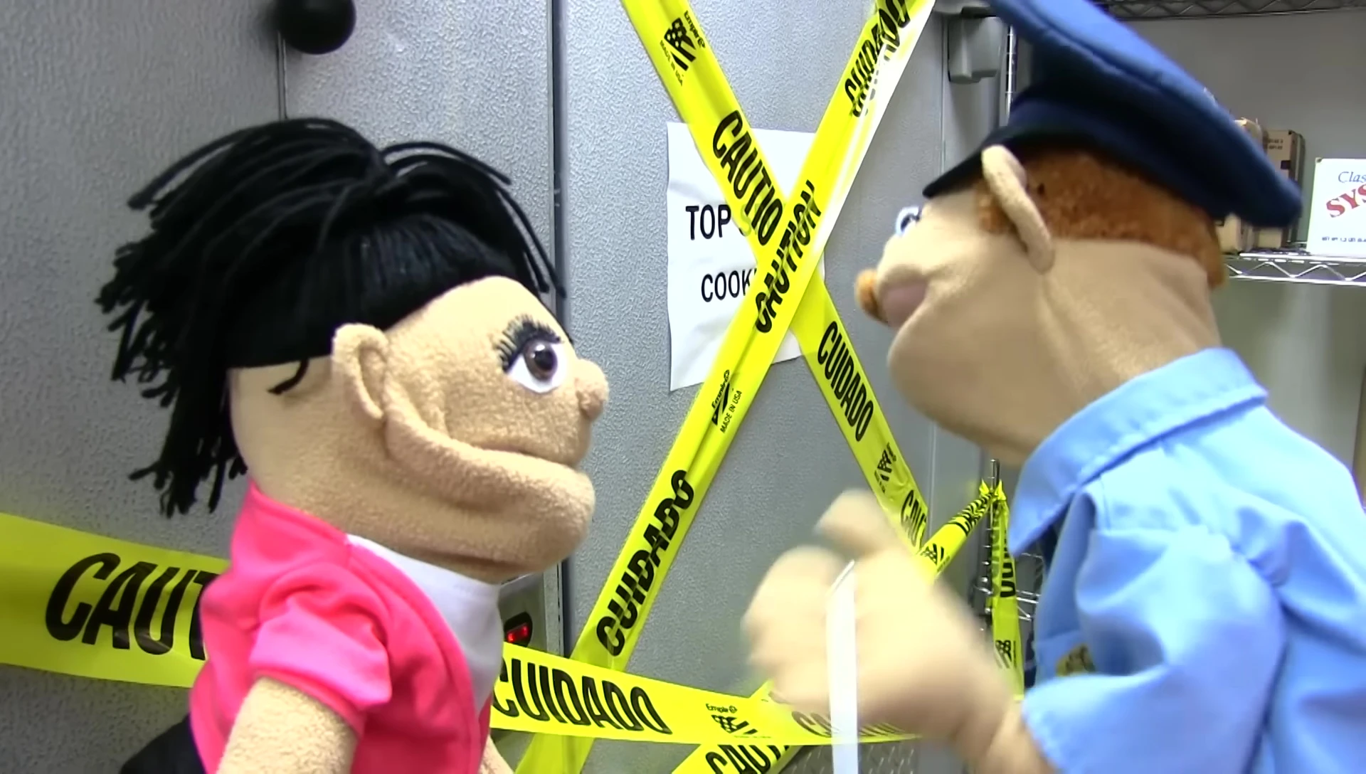 Officer Marvin determinedly entering the cookie jar.