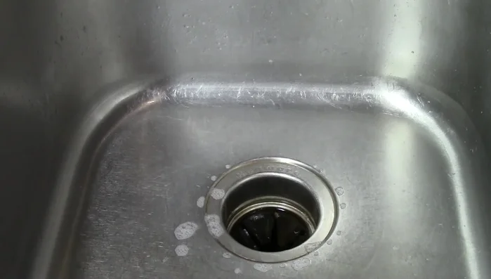 Run the disposal with water to rinse away the bleach.