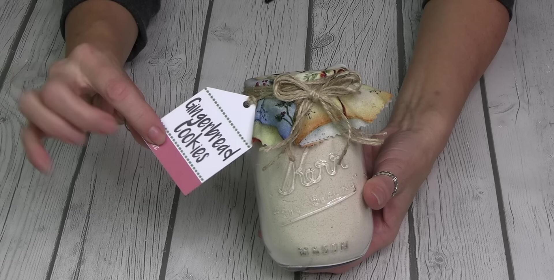 Mason jar with gingerbread cookie mix and tag