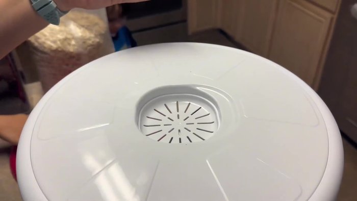 If using different grains, utilize the removable divider to separate them into different sections.