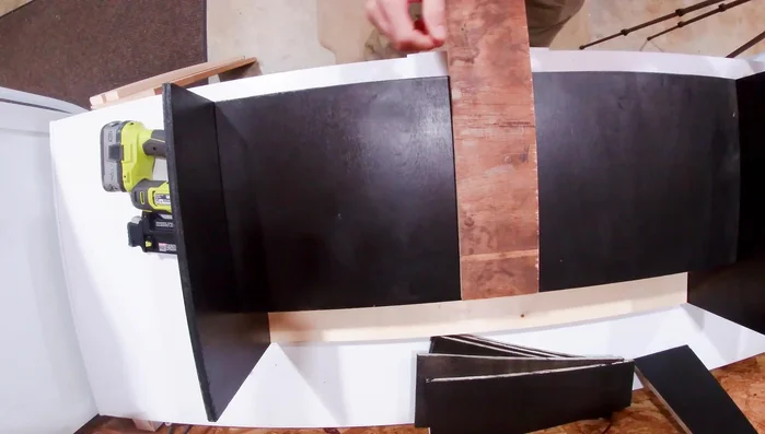 Add a spacer piece matching the can width to ensure proper can alignment during the rolling process.