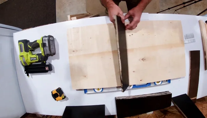 Construct the angled brackets. These brackets are key to creating the sloped surface for the cans to roll down. The dimensions shown are 6 inches on one side and 4 inches on the other, creating a 1-inch rise.