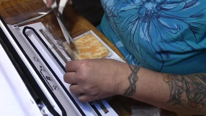 Cut off the excess straw and reseal the edge if needed.