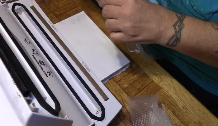 Place a notepad under the bag to keep it flat.