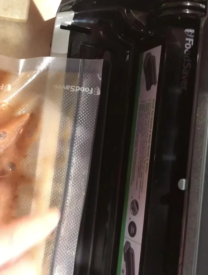 Once the first seal is complete, use a paper towel to clean any residue from the bag.