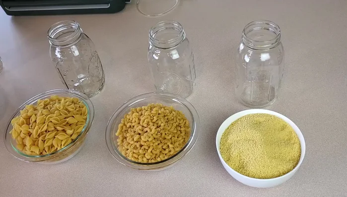 Prepare your pasta and jars. Choose smaller pasta shapes (shells, macaroni, elbows, couscous) for optimal jar space utilization.