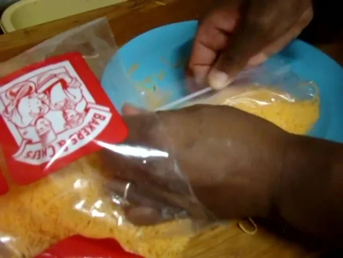 Optional: Stack the filled bags on a plate to catch any cheese that spills while removing them from the larger bag.