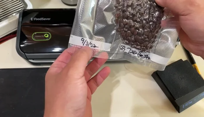 Store the vacuum-sealed bag of coffee beans in the freezer.
