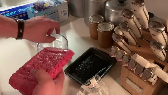 Place your meat (ground beef in this example) into the freezer bag.