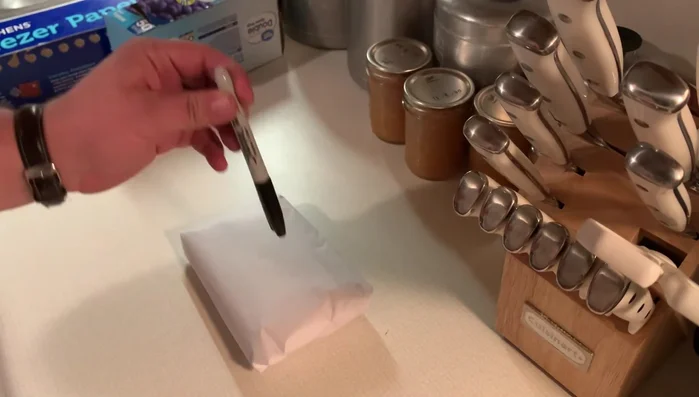 Label the package with a Sharpie, including the date, type of meat, and weight.