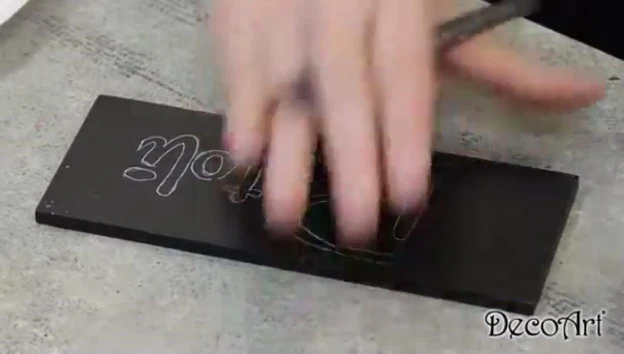 The narrator highlighting the gold paint.