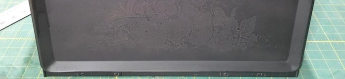 Spray paint the entire bread box white. Allow to dry completely and apply a second coat.