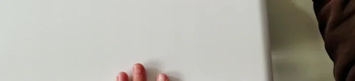 Lightly distress the paint using a fine sanding block. Focus on edges and corners for a subtle, aged look.