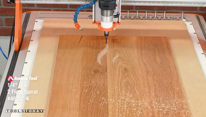 Cut pockets in the backer board using a CNC router with a 1/4in down cut bit for initial material removal, followed by a 1/8in bit for finer details. Use a compression bit for clean top and bottom surfaces.