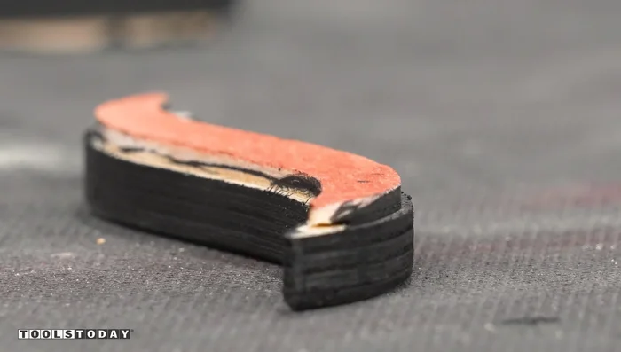 Address raised grain on the stained inlay pieces with a steel bristle brush.