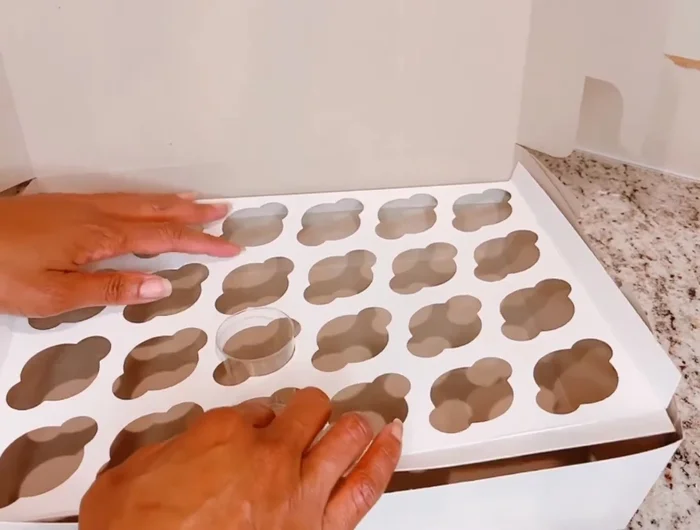 Secure the insert to the sides of the box using a staple gun. Staple on the left, then right, and finally the front of the box.