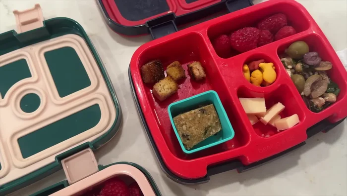 Bulk make and freeze lunch items: Prepare and freeze items like Uncrustables, pizza rolls, meatballs, soup, or mac and cheese for easy grab-and-go mornings.