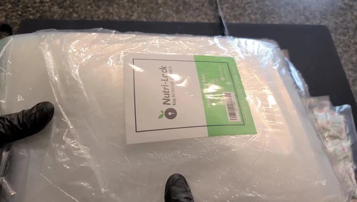 Prepare the bags: Use pre-cut vacuum seal bags for ease of use, especially with a budget sealer. The factory seal on one end provides better strength than what your sealer alone can achieve.