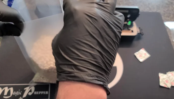 Vacuum seal the bags: Place the bag's textured side up into the vacuum sealer, ensuring the edge is properly positioned within the gasketed area. Close and activate the sealer, allowing it to fully remove air until the bag is rock-hard.