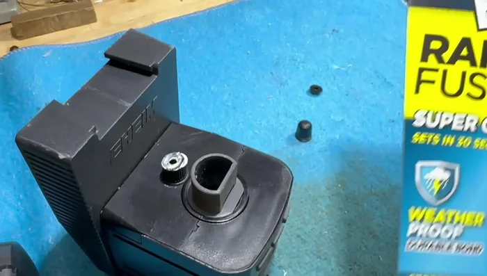 Ensure the cap is securely glued and positioned to provide support to the feeder mechanism during rotation.