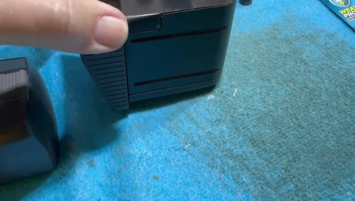 Ensure the cap is securely glued and positioned to provide support to the feeder mechanism during rotation.