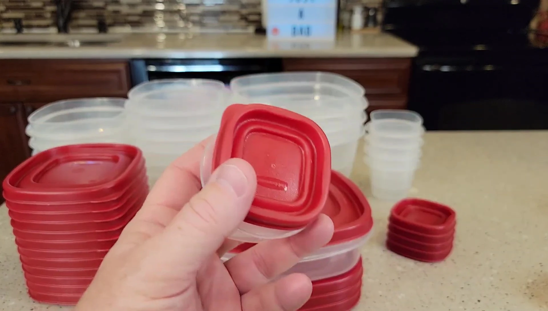 Demonstrating the lid snap-on feature
