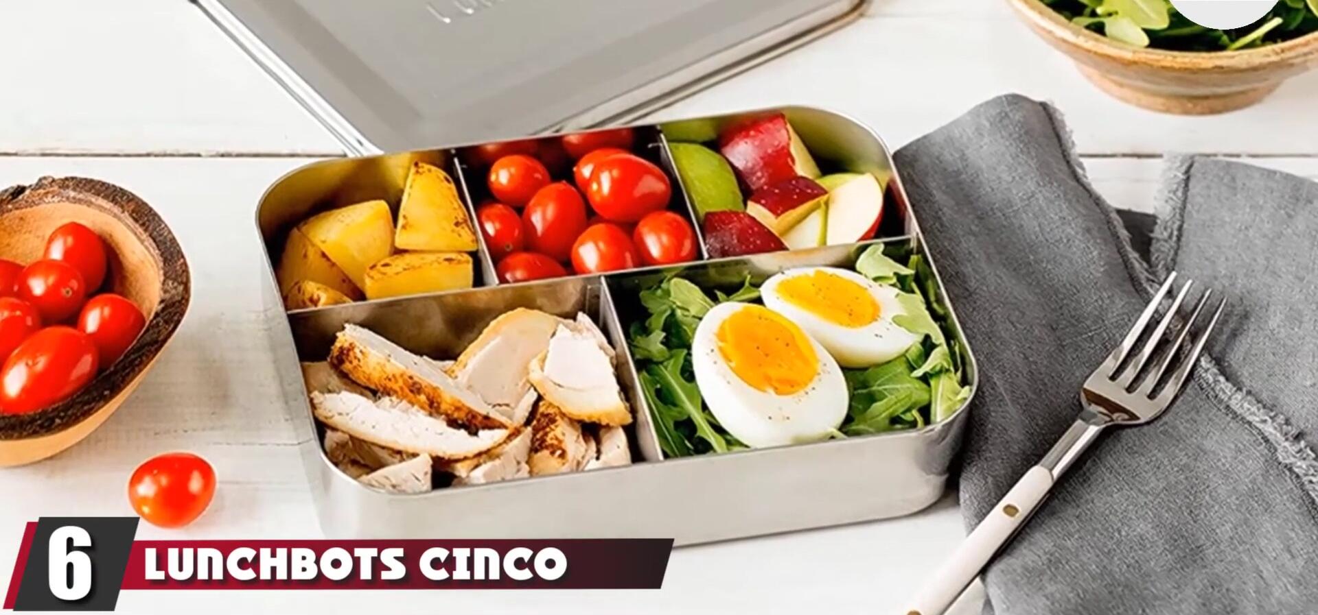 The LunchBots Cinco stainless steel lunch container open, showing its multiple compartments.