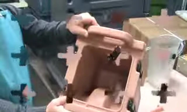 Tightening the wing nut to fix leaks