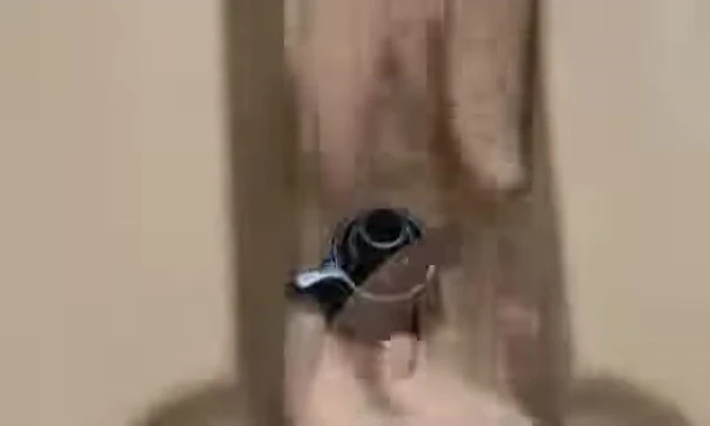 Pressing the wing nut downward