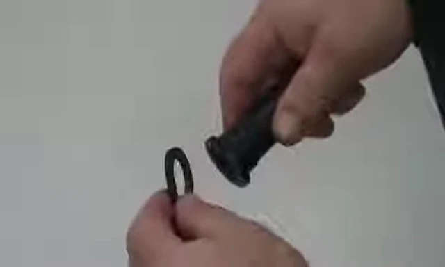 Placing the rubber washer on the spout