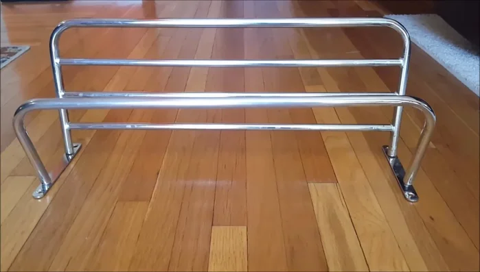 Install the towel rack on the wall.