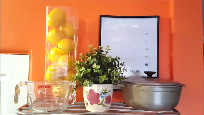Add decorative items to the top of the towel rack (optional).