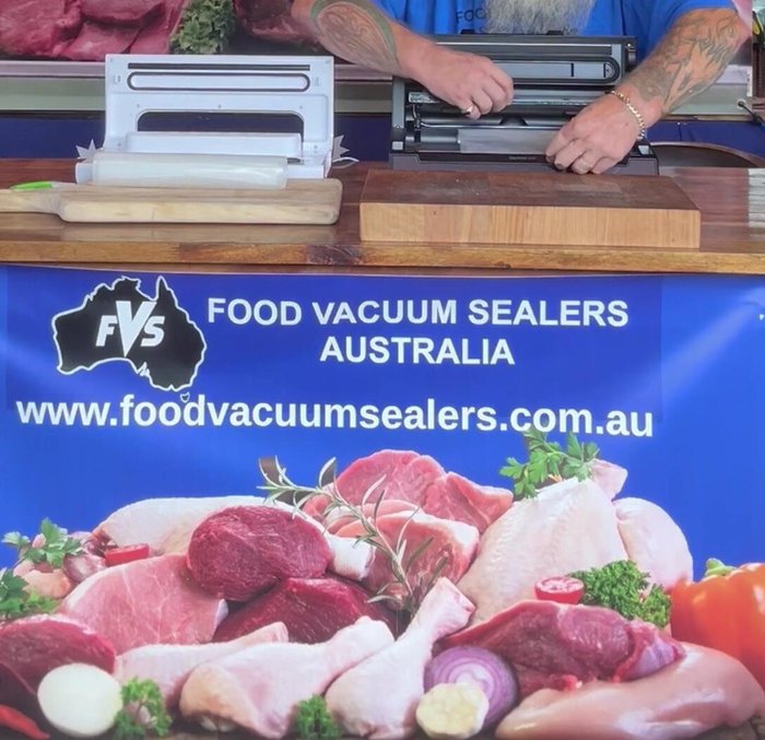 Pop the lid down, lock it, and hit "seal" to seal one end of the roll.