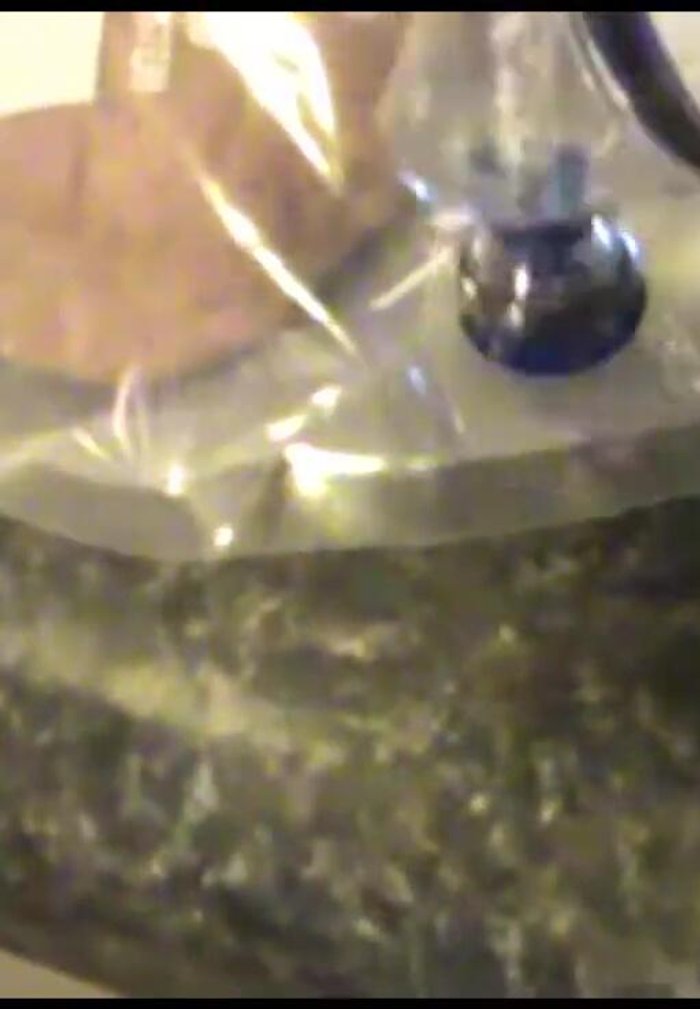 Continue vacuum sealing until no further progress is seen (approximately 15-20 seconds).