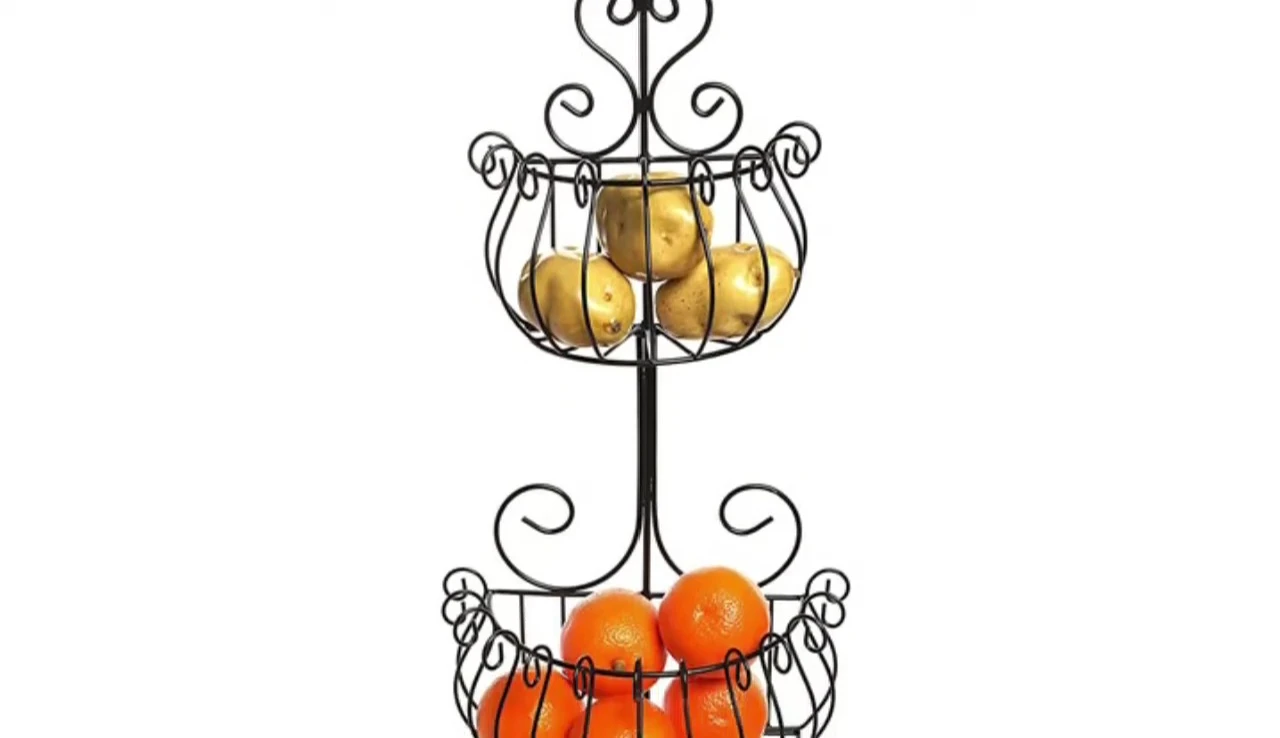 The Mega Wall Mounted Storage Basket shown in a kitchen setting, highlighting its use for storing fruit and spices.