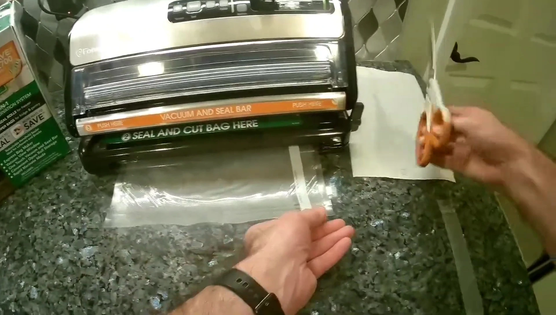 Trimming the excess bag material after the double seal