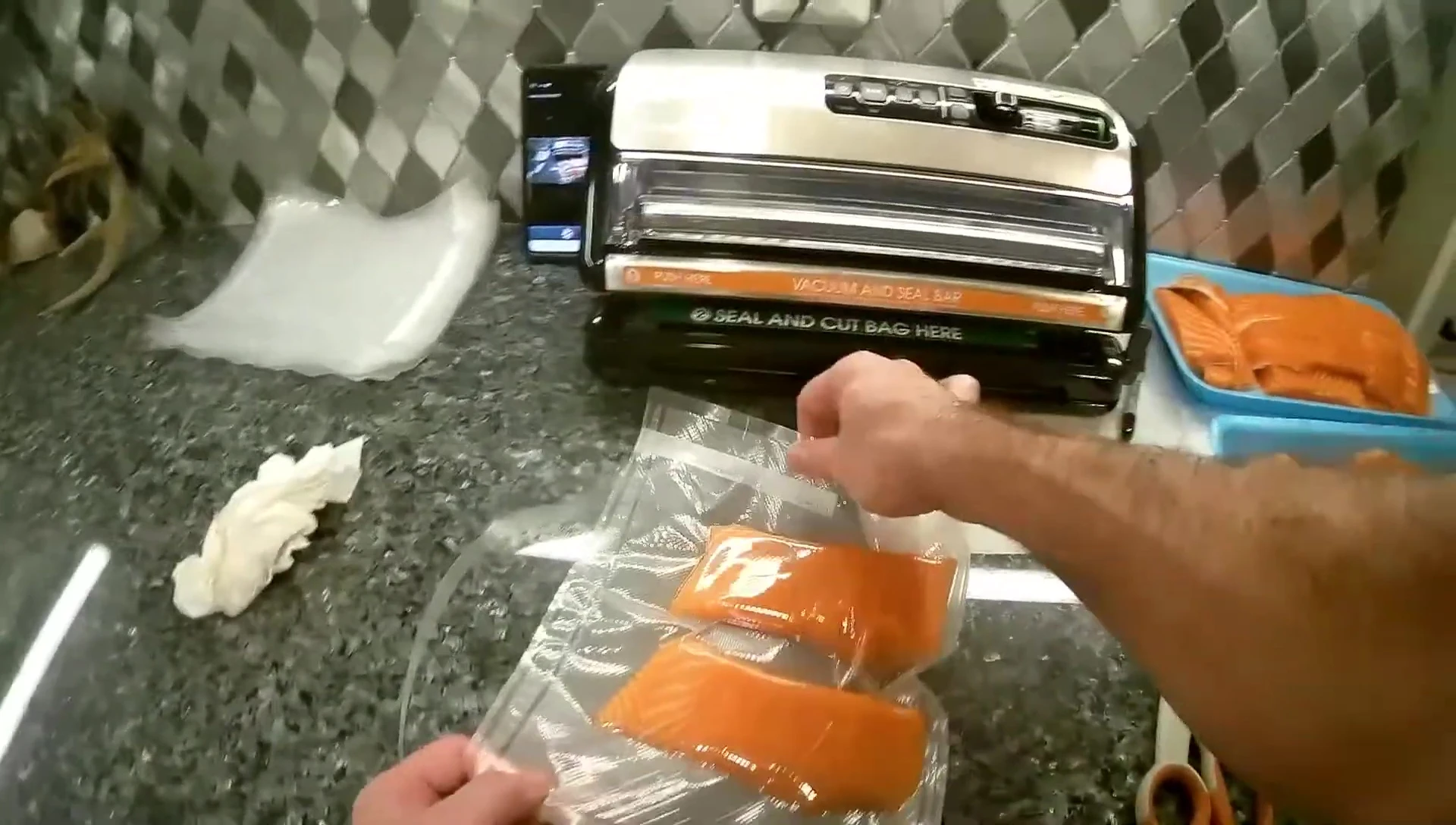 Labeling the sealed bag with contents and date