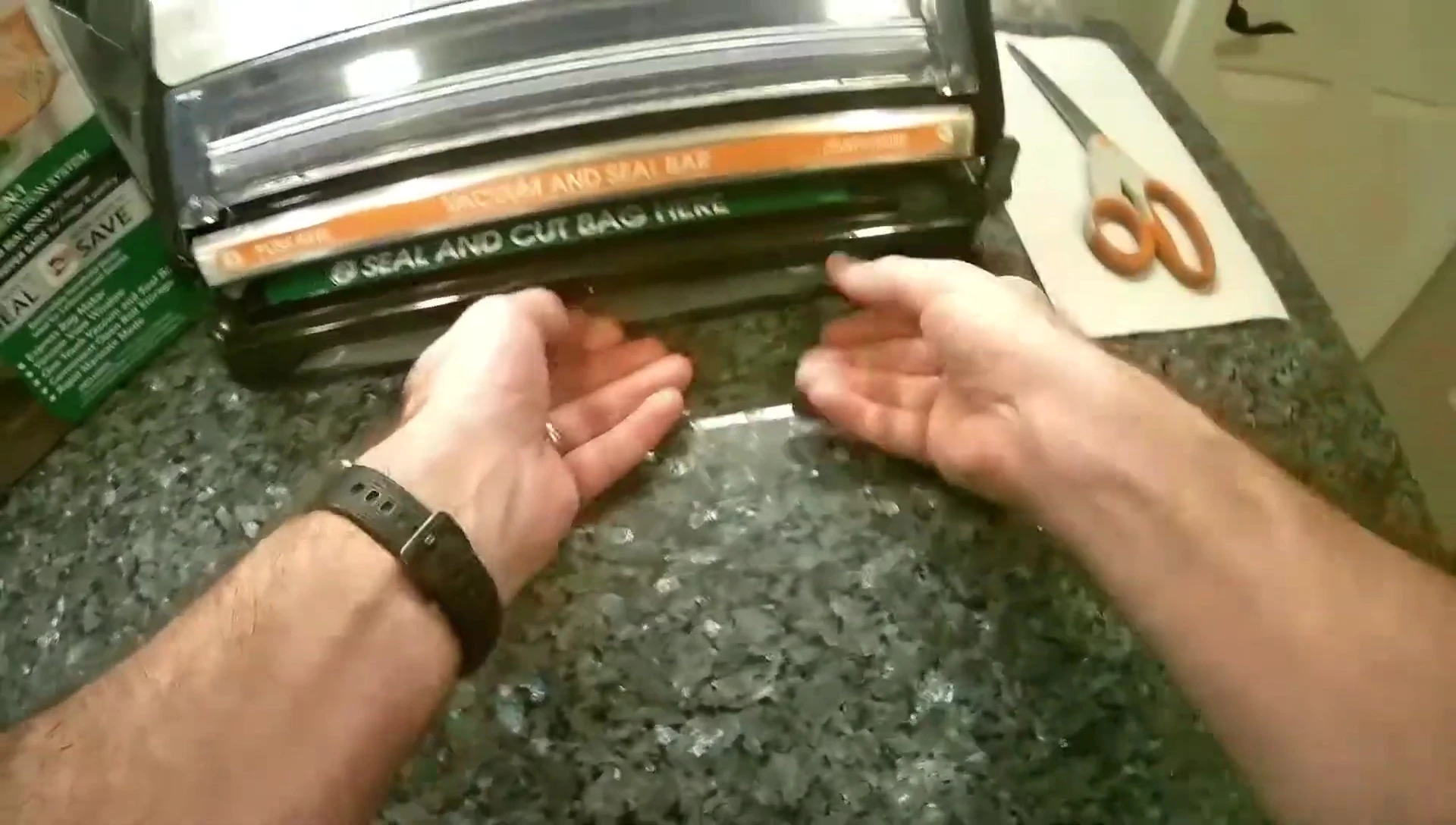 The bag being inserted and leveled in the FoodSaver machine