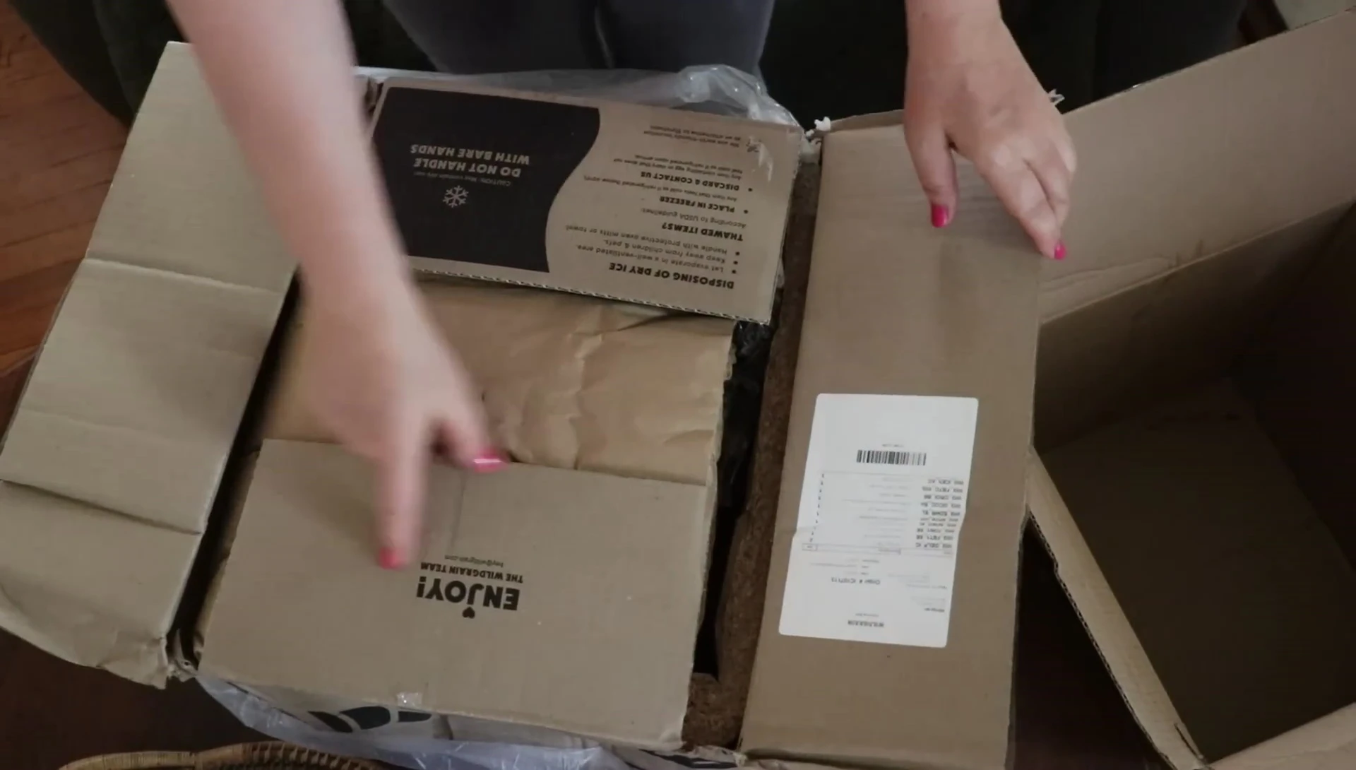 Close-up of the WILDGRAIN box's branding and logo.