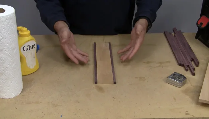 Glue the sides together. A cool trick involves using tape to keep the pieces aligned and create a tight gluing surface.