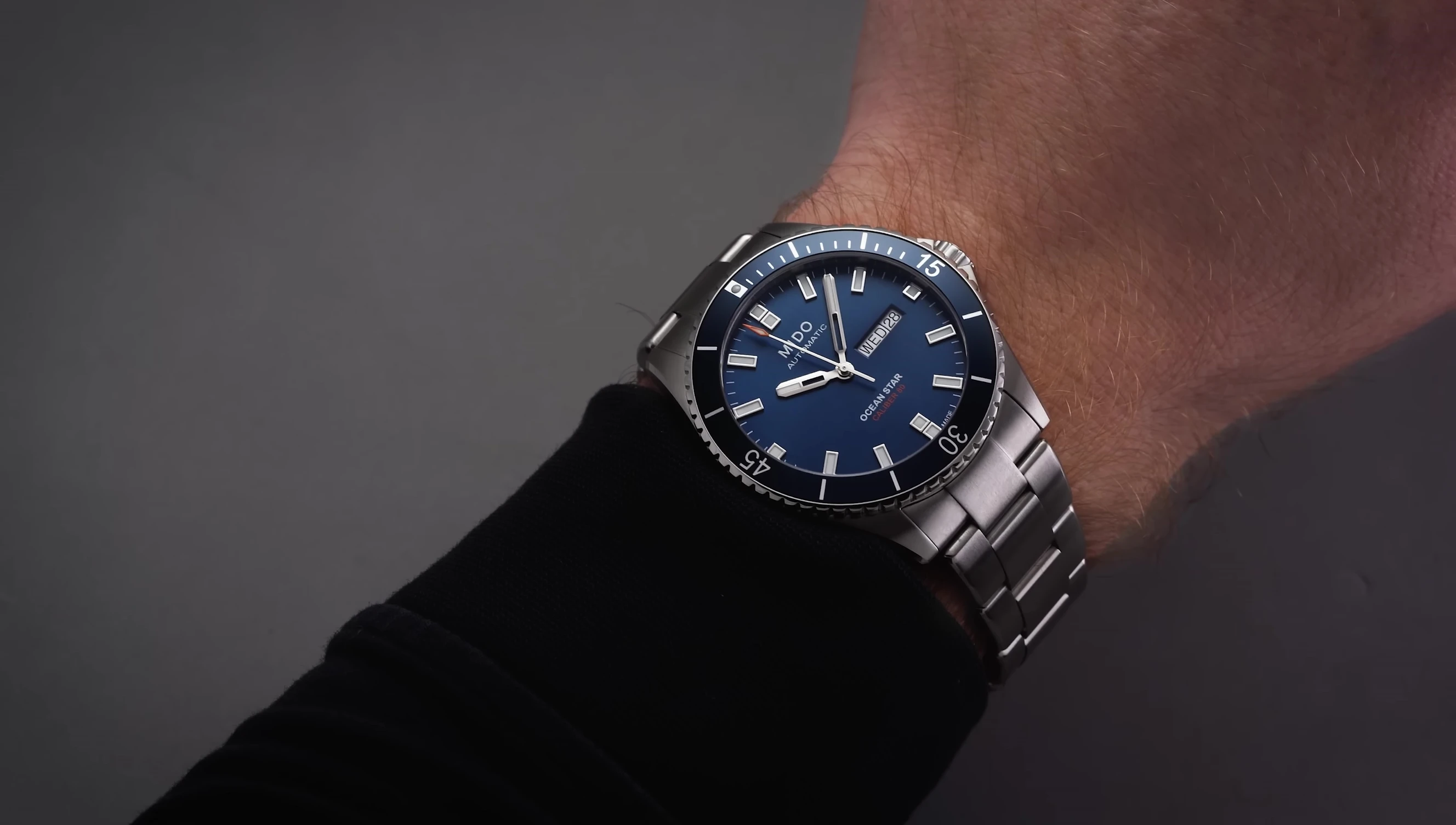 Wrist shot showcasing the size and proportions of the Mido Ocean Star 200 on a wrist